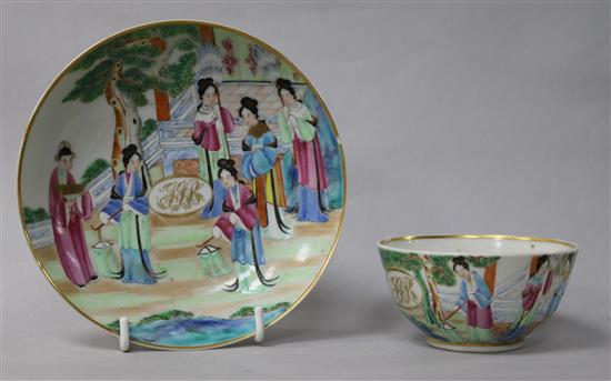 A Cantonese porcelain tea bowl and saucer, with gilt painted European monograms